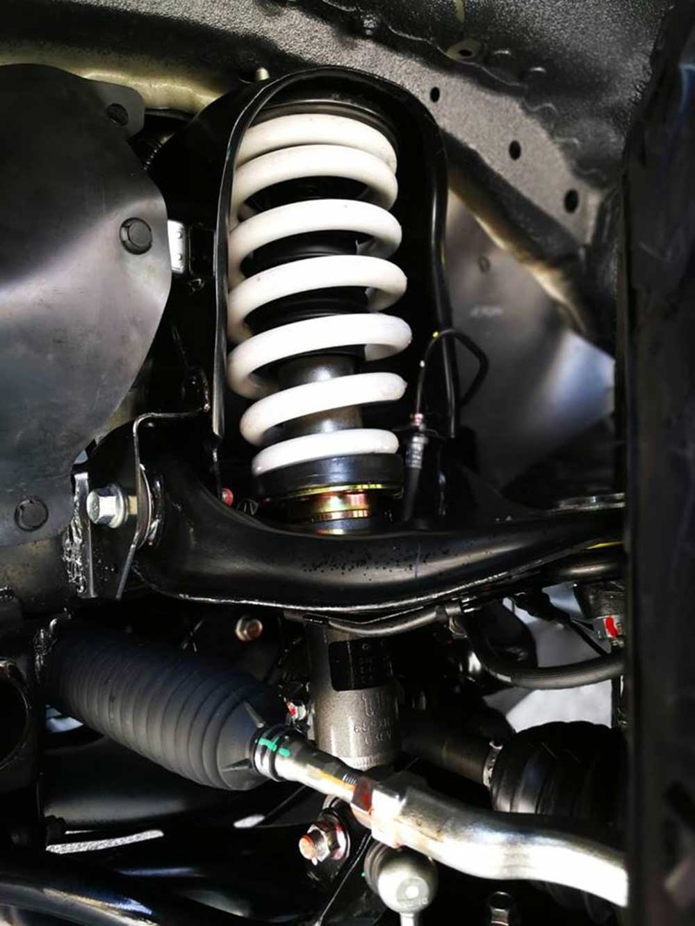 Giảm xóc Pajero Sport